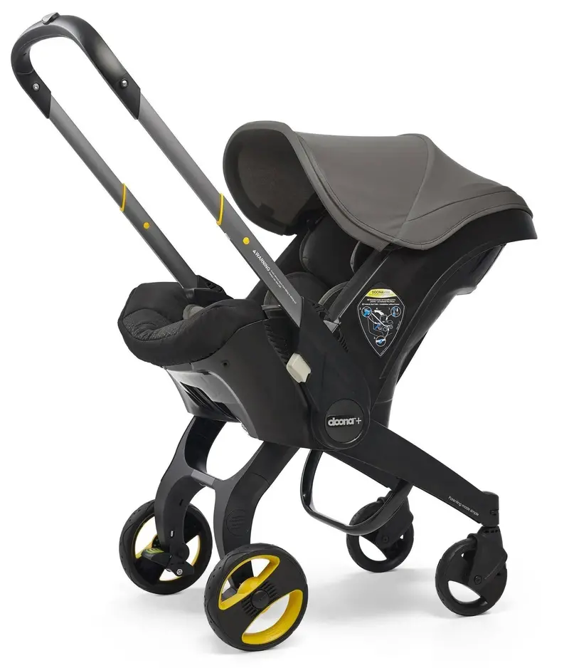 Fotelik samochodowy i wózek dziecięcy Doona Grey Hound Convertible All-in-One